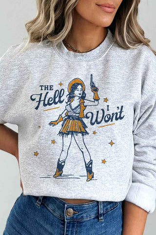 "THE HELL I WONT" graphic sweatshirt in ash with a classic fit. Model is wearing the sweatshirt with jeans.